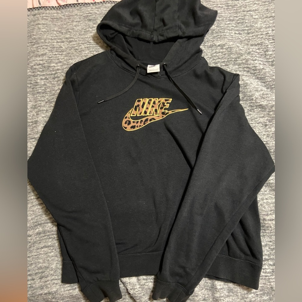 Black Nike Hoodie that says Nike in Cheetah print LIKE NEW